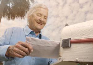 man mailing a letter