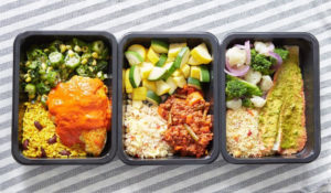 A photo of three healthy meals prepped for a later time.