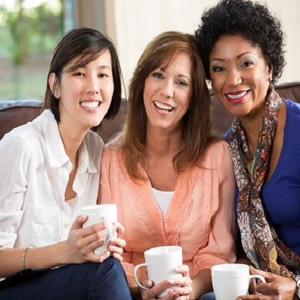 three women smiling together